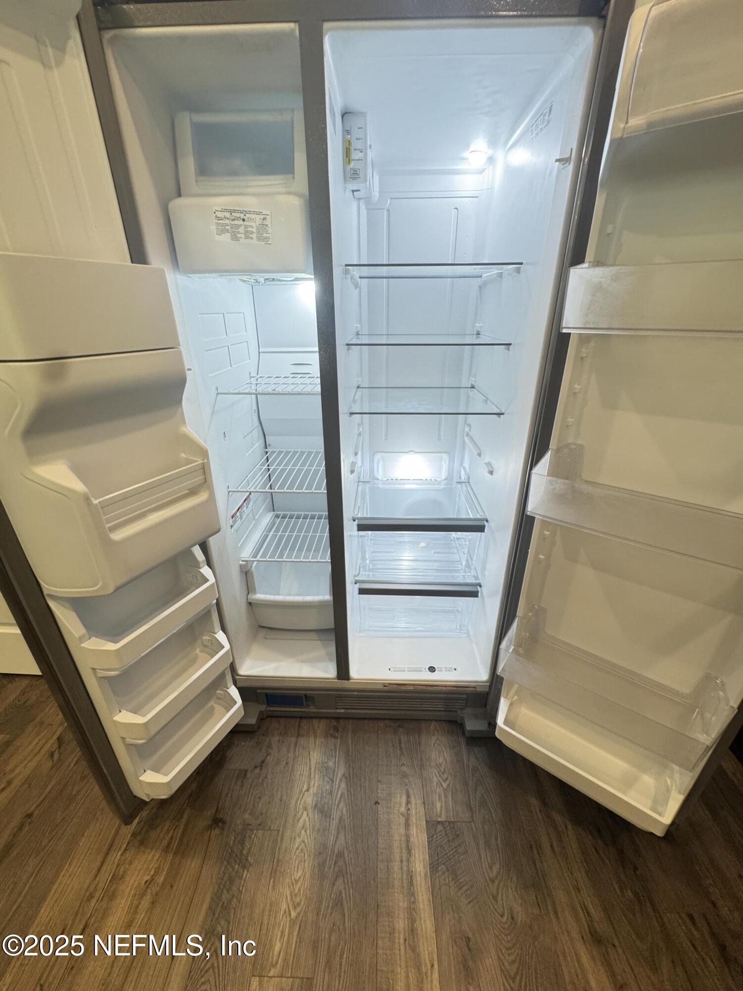 13505 Ute Jacksonville, FL 32218 - Photo 13 of 34 a view of an empty room and wooden floor