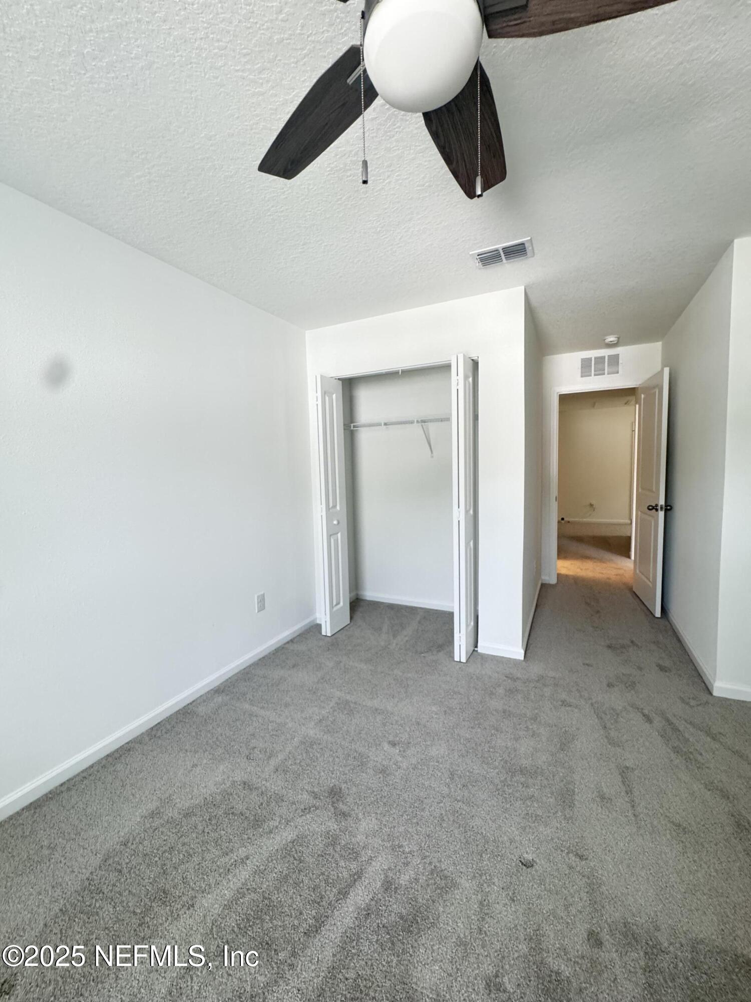 13505 Ute Jacksonville, FL 32218 - Photo 19 of 34 a view of an empty room and window
