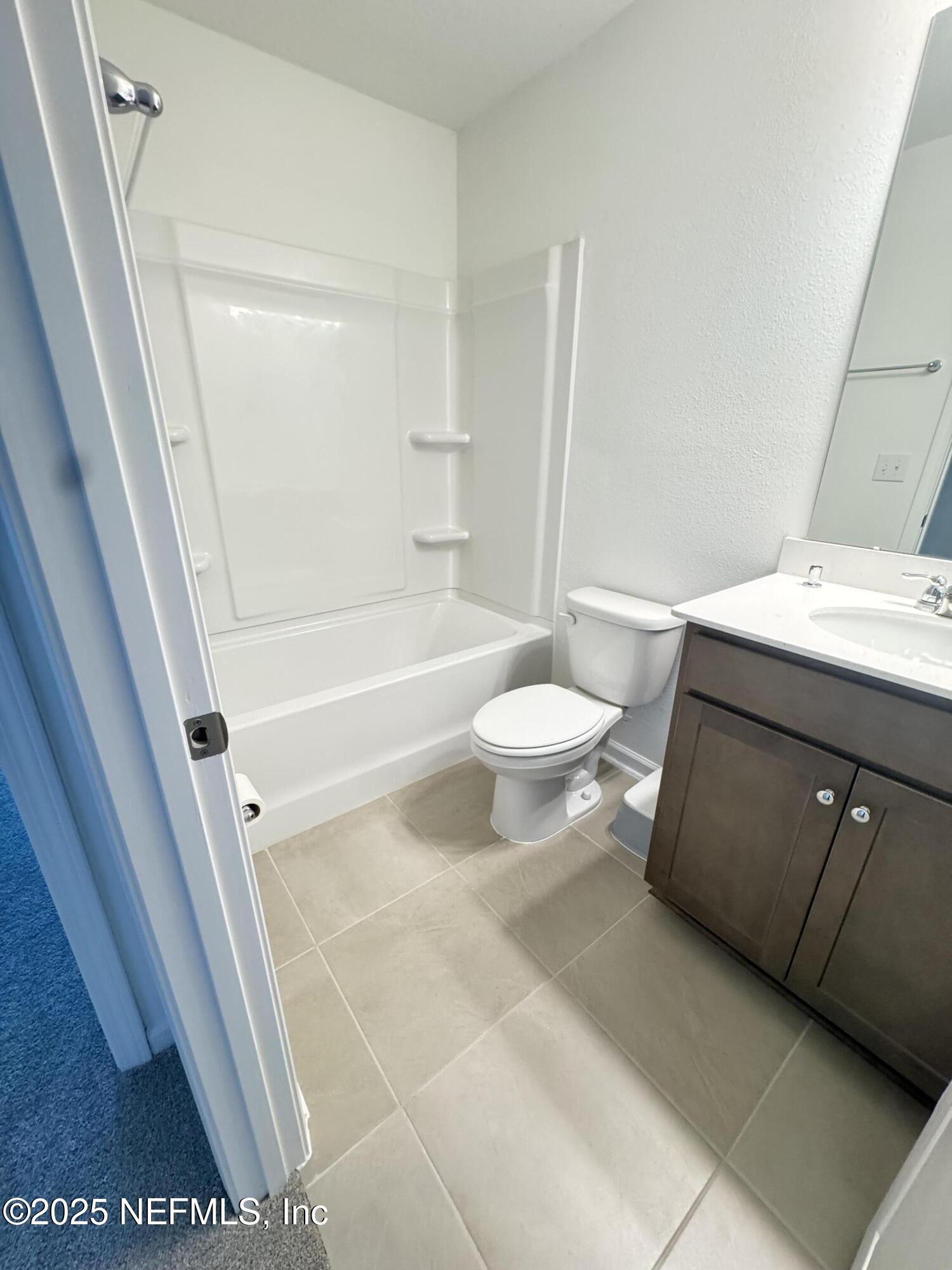 13505 Ute Jacksonville, FL 32218 - Photo 20 of 34 a bathroom with a sink a toilet and a bathtub