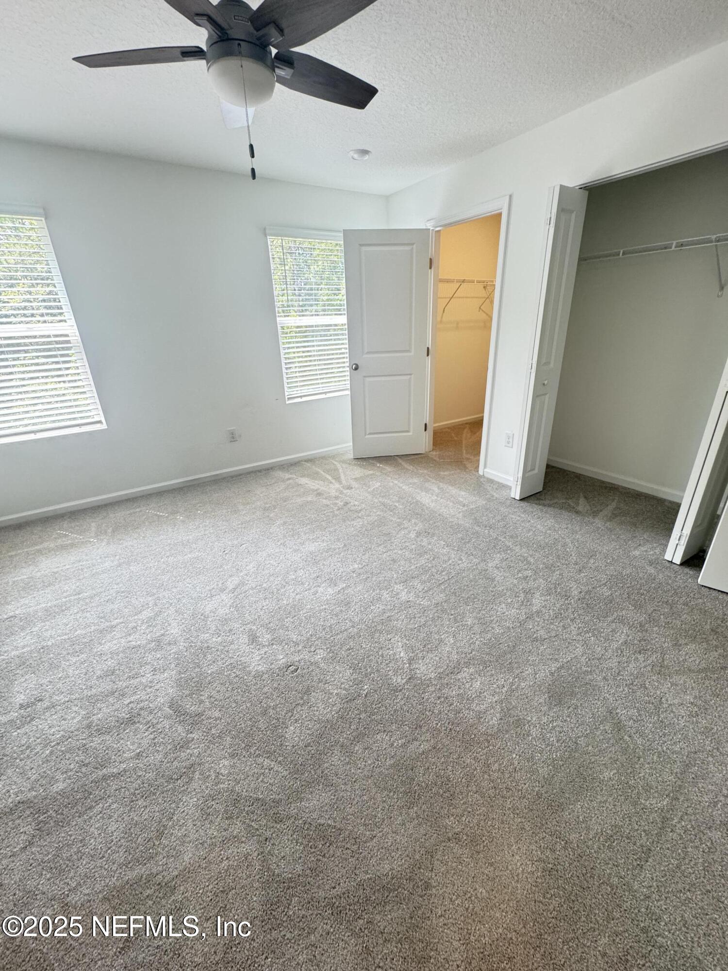 13505 Ute Jacksonville, FL 32218 - Photo 23 of 34 an empty room with a empty space and windows