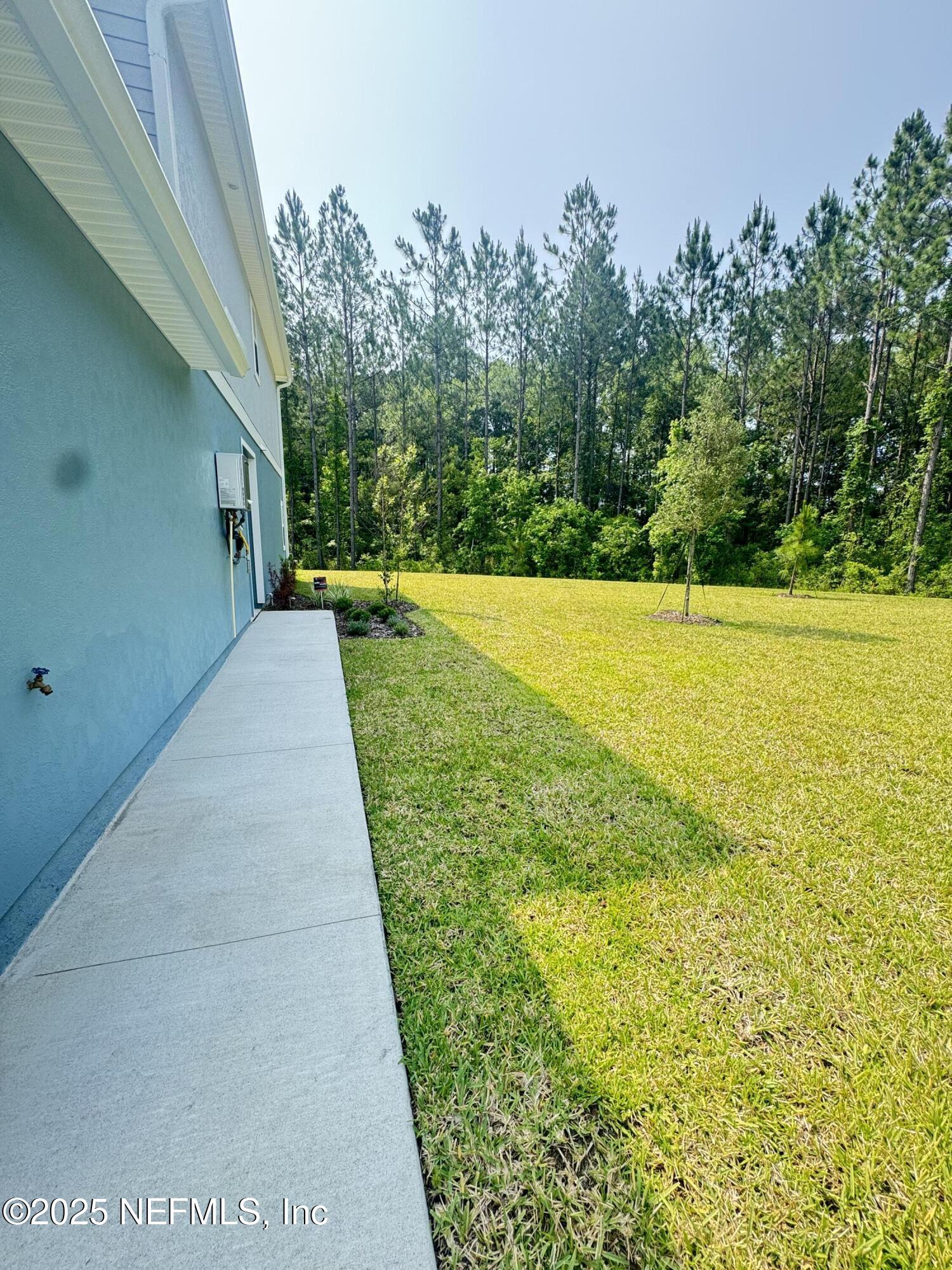 13505 Ute Jacksonville, FL 32218 - Photo 9 of 34 a view of a yard with an outdoor space
