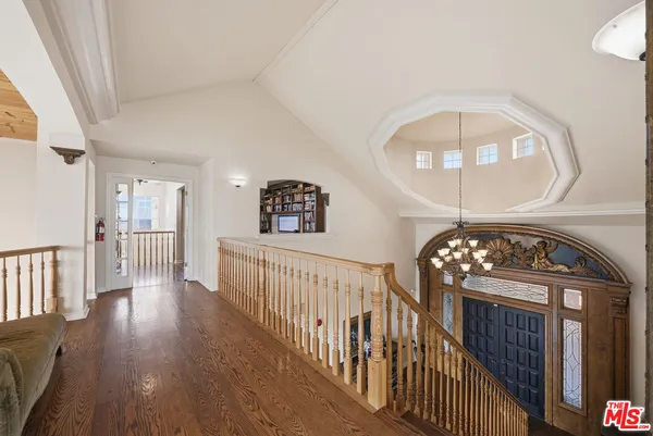 a view of entryway with wooden floor