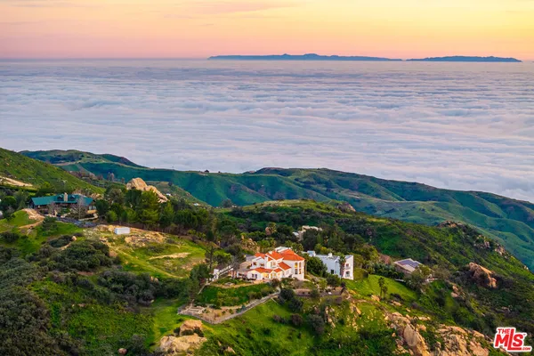 a view of lake with ocean