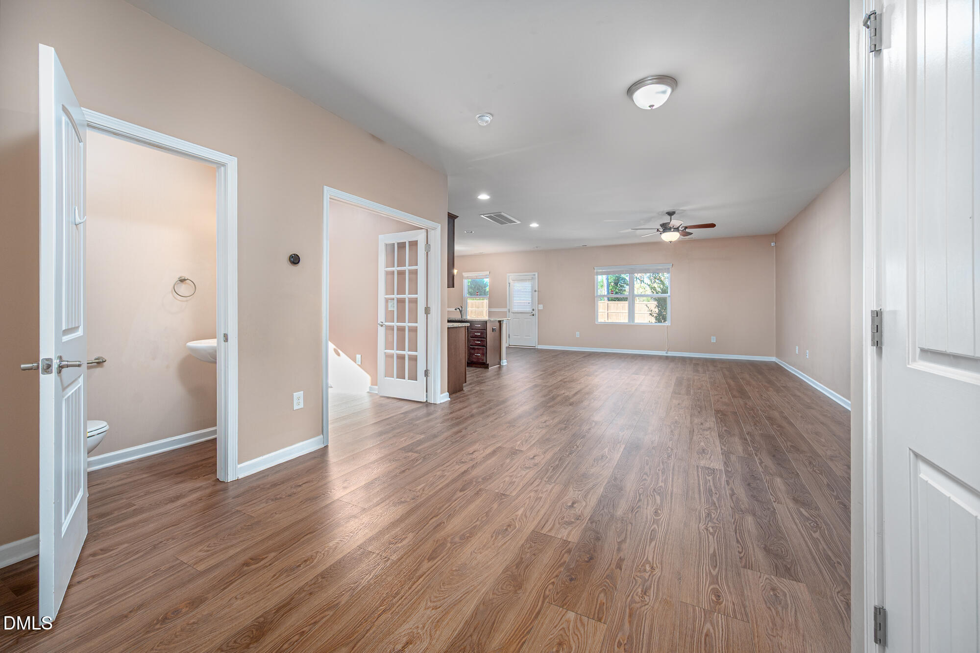 3548 Althorp Drive Raleigh, NC 27616 - Photo 5 of 56 wooden floor in an empty room with a window
