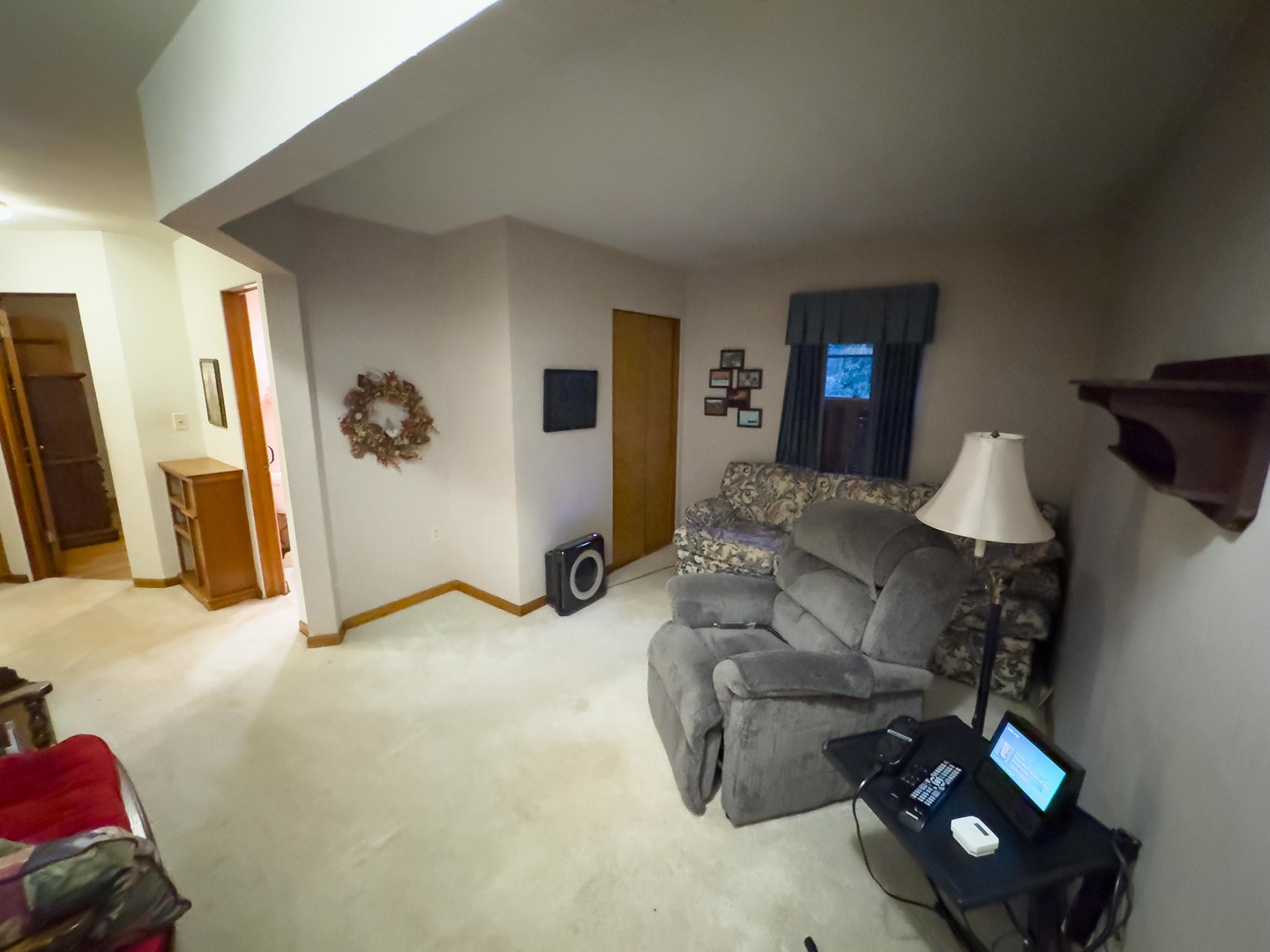 19256 1330 E Road Pontiac, IL 61764 - Photo 23 of 36 a living room with furniture and a flat screen tv
