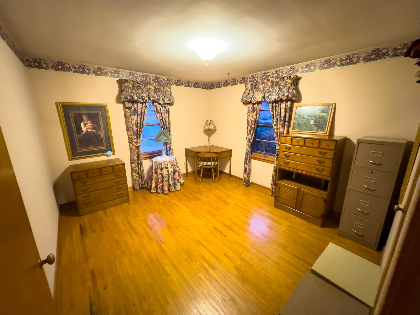 19256 1330 E Road Pontiac, IL 61764 - Photo 28 of 36 a bedroom with furniture and a flat screen tv