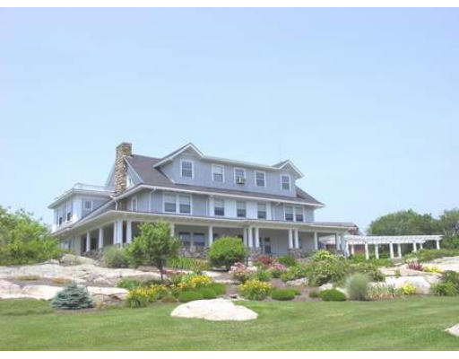 70 B Grapevine Road, Unit B2 Gloucester, MA 01930 - Photo 1 of 1 a front view of a house with a yard