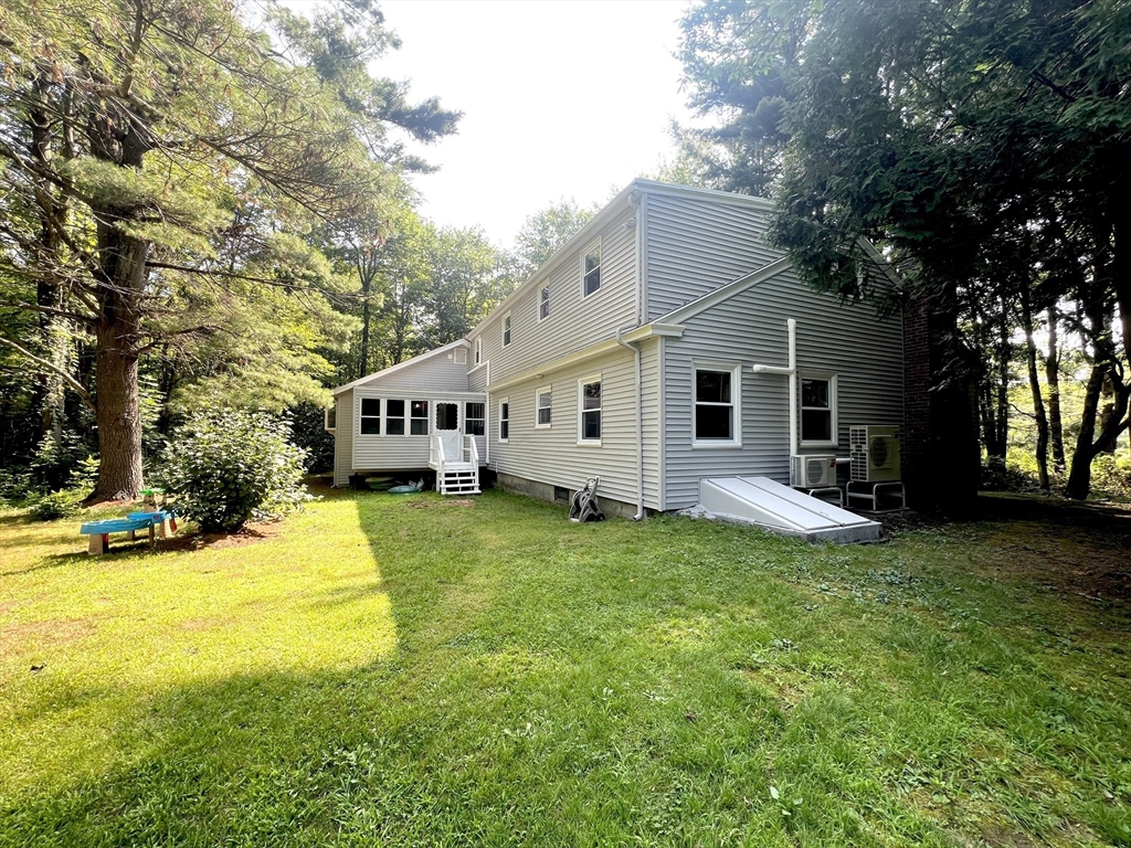 147 Wachusett Street Rutland, MA 01543 - Photo 41 of 41 a view of a house with a backyard