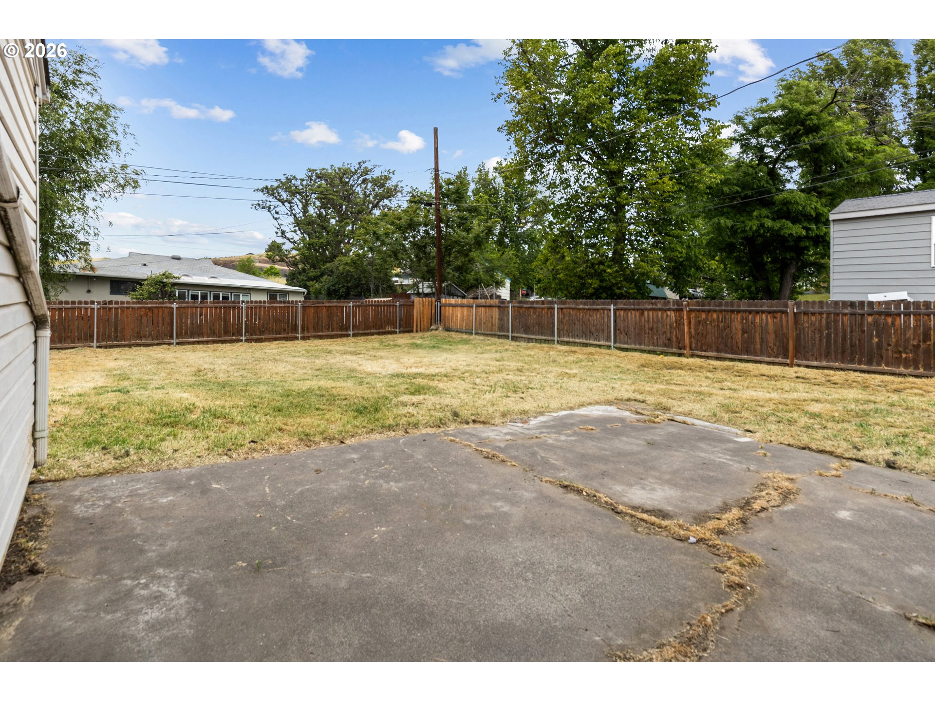 3009 Southwest Isaac Avenue Pendleton, OR 97801 - Photo 6 of 28 a swimming pool with outdoor seating and yard