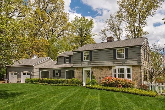 11 Crescent Road Greenwich, CT 06878 - Photo 1 of 1 a front view of house with yard and green space