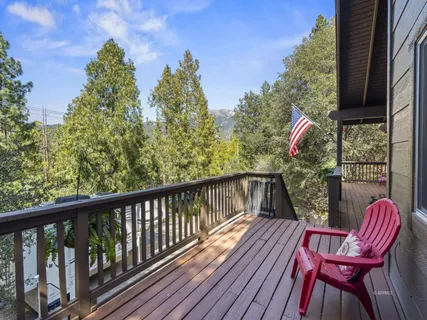 a view of balcony with furniture