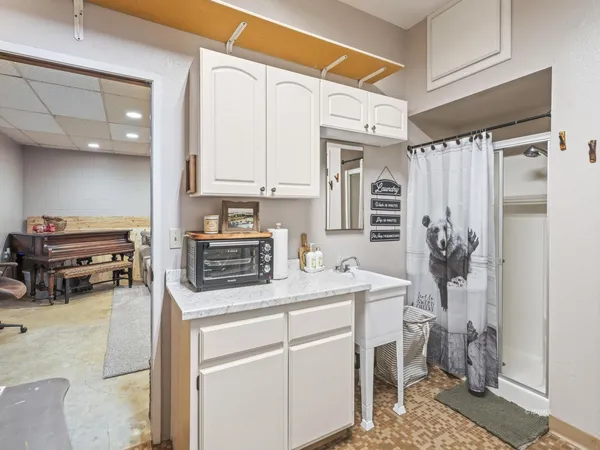 a kitchen that has a cabinets and appliances