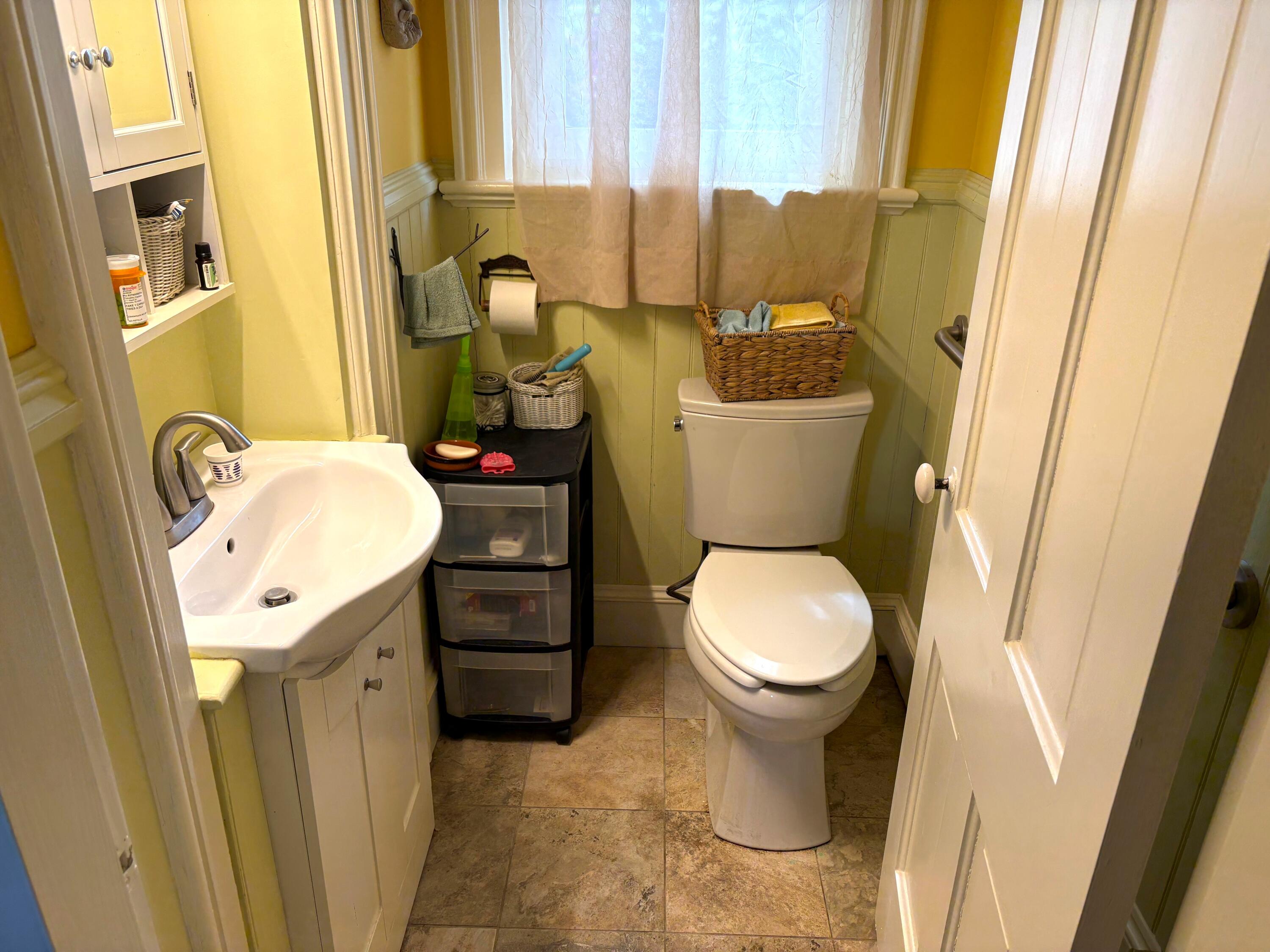 211 Maple Street Manistee, MI 49660 - Photo 18 of 40 Main level half bath