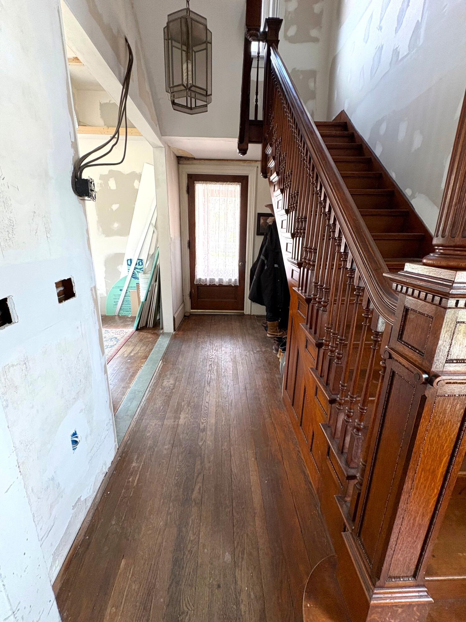 211 Maple Street Manistee, MI 49660 - Photo 8 of 40 Staircase and front entry