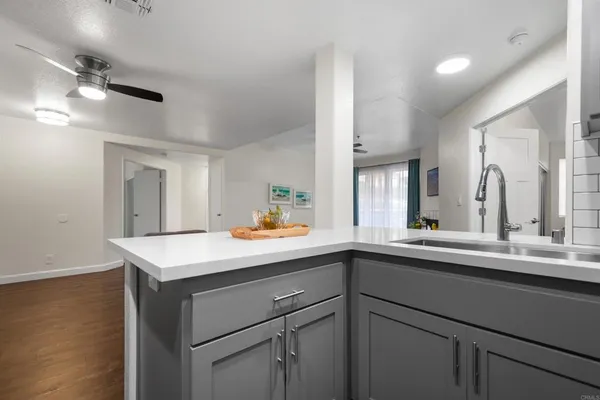 a kitchen with a sink and a window