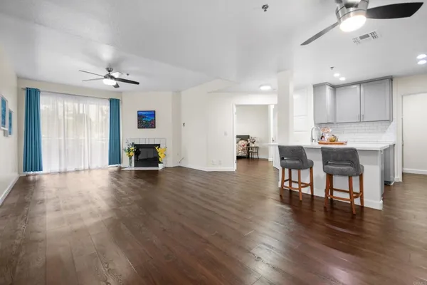a view of a kitchen and dining room