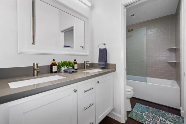 a bathroom with a sink and a bathtub