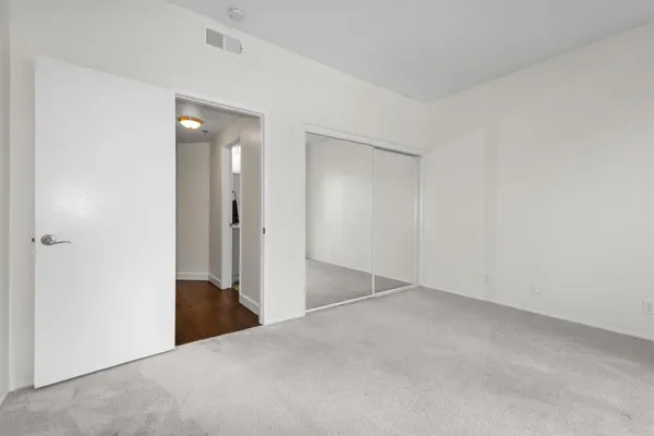 an empty room with a bathroom