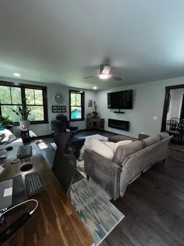 a bedroom with a large bed and a dresser