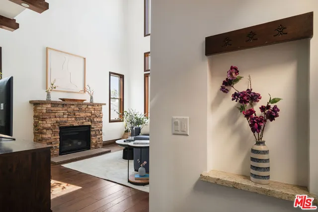 a view of bathroom with a sink and a mirror
