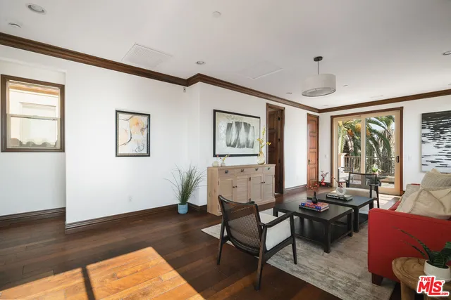 a view of a balcony with lake view and a patio