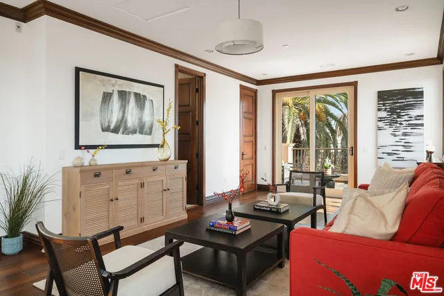 a view of a swimming pool with a table and chairs