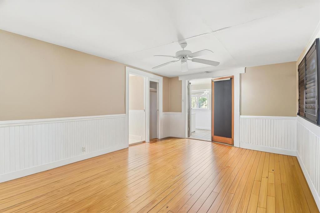 5415 Riverside Drive Yankeetown, FL 34498 - Photo 14 of 45 a view of an empty room with wooden floor