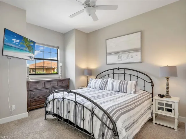 a kitchen with a sink cabinets and window