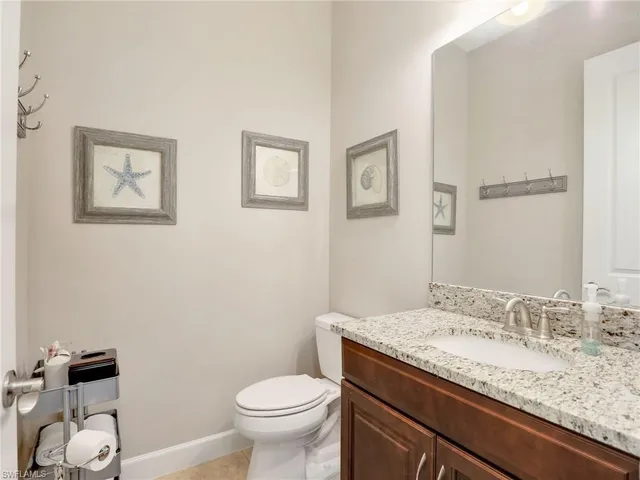 a spacious bedroom with a bed and a window