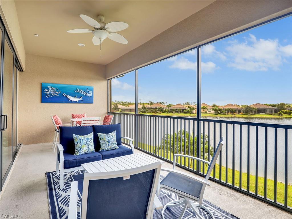 9685 Montelanico Loop, Unit 202 Naples, FL 34119 - Photo 29 of 41 a view of a dining room with furniture window and outside view