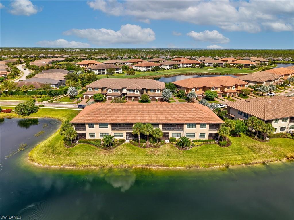 9685 Montelanico Loop, Unit 202 Naples, FL 34119 - Photo 31 of 41 a view of an ocean with city view