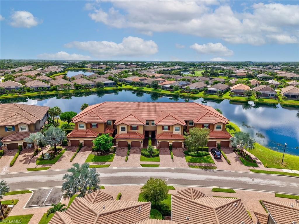 9685 Montelanico Loop, Unit 202 Naples, FL 34119 - Photo 5 of 41 an aerial view of multiple house