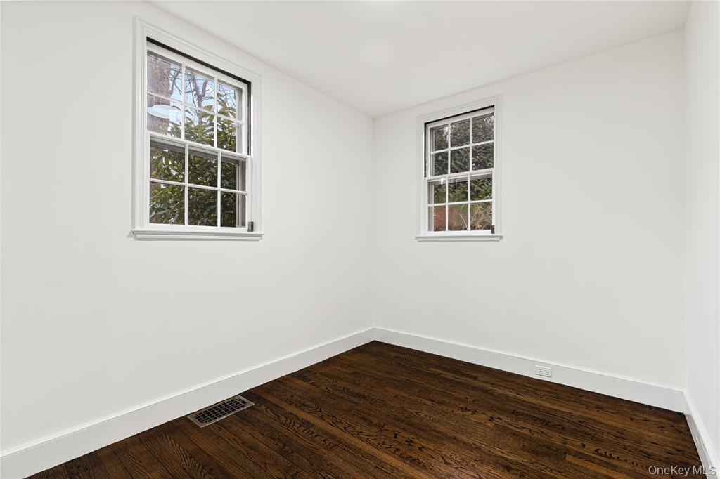 6 Fox Meadow Road Scarsdale, NY 10583 - Photo 7 of 20 Spare room with baseboards, and dark wood finished floors