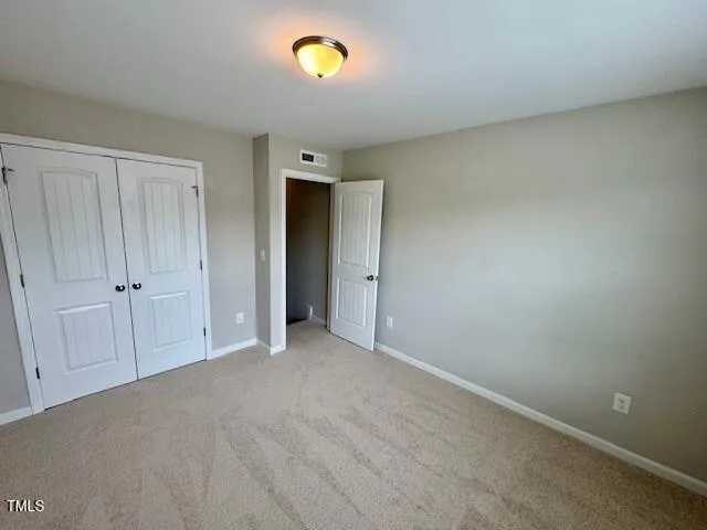 an empty room with a natural light