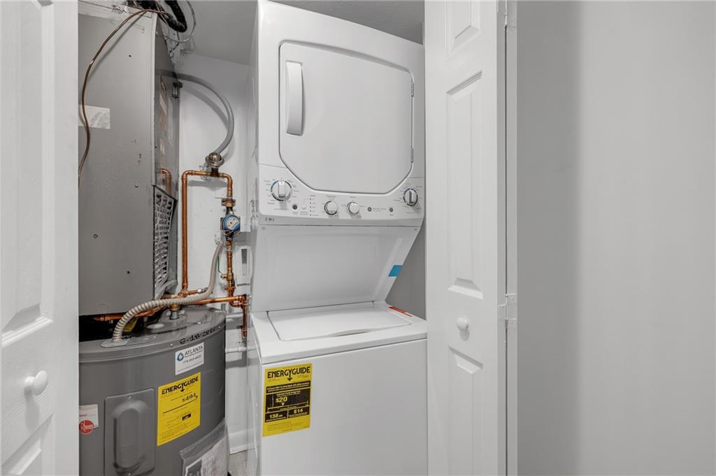 1150 Collier Road Northwest, Unit 2J Atlanta, GA 30318 - Photo 16 of 41 a utility room with dryer and washer
