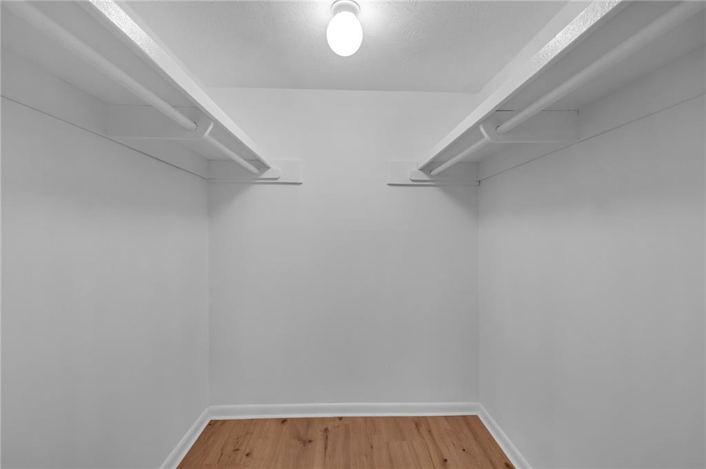 1150 Collier Road Northwest, Unit 2J Atlanta, GA 30318 - Photo 21 of 41 a view of small space with racks on the wall