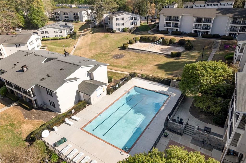 1150 Collier Road Northwest, Unit 2J Atlanta, GA 30318 - Photo 41 of 41 an aerial view of a house with swimming pool