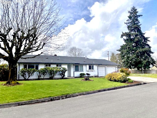 3308 Wisteria Street Eugene, OR 97404 - Photo 1 of 19 a front view of house with yard and green space