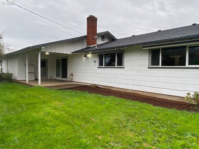 3308 Wisteria Street Eugene, OR 97404 - Photo 16 of 19 a front view of a house with garden