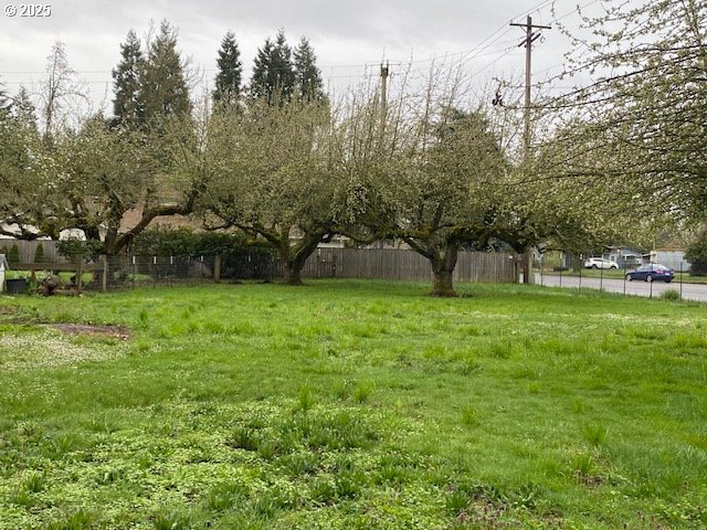 3308 Wisteria Street Eugene, OR 97404 - Photo 18 of 19 a view of green field with trees in the background