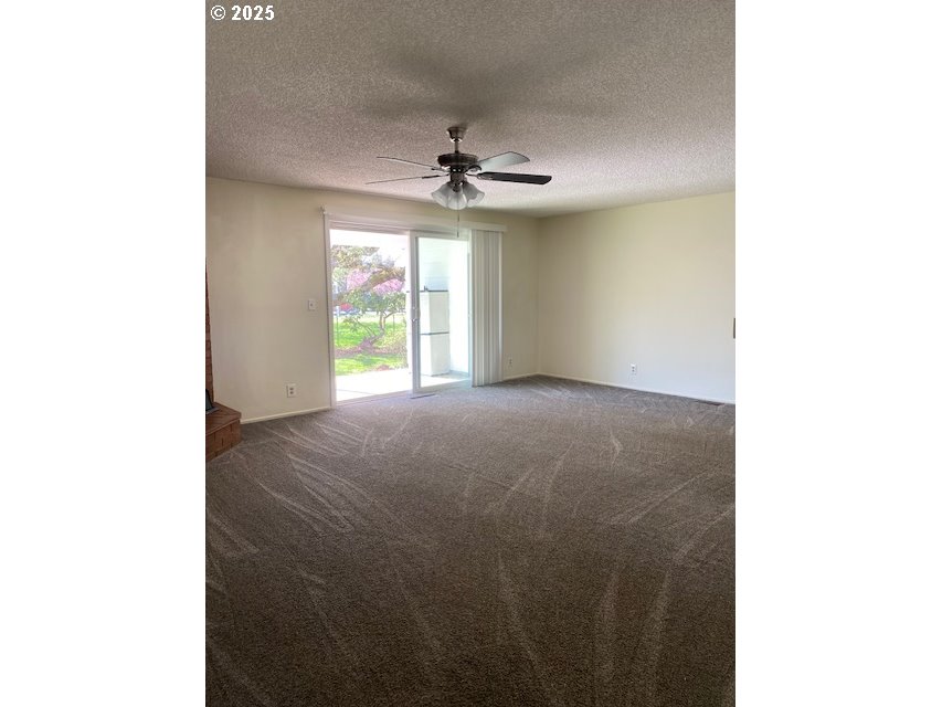 3308 Wisteria Street Eugene, OR 97404 - Photo 8 of 19 a view of an empty room with a window