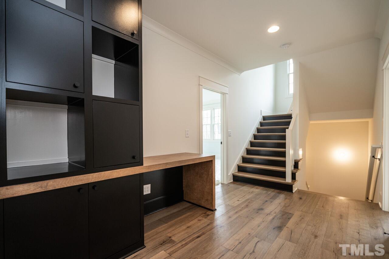 1104 Shelley Road Raleigh, NC 27609 - Photo 29 of 45 a view of entryway with wooden floor