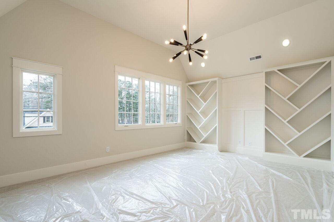 1104 Shelley Road Raleigh, NC 27609 - Photo 40 of 45 a view of an empty room with a window