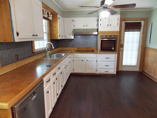 12698 Versailles Road Rockvale, TN 37153 - Photo 13 of 30 a kitchen with granite countertop a sink and cabinets