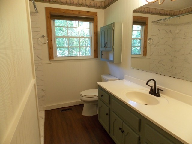 12698 Versailles Road Rockvale, TN 37153 - Photo 19 of 30 a bathroom with a sink and a toilet
