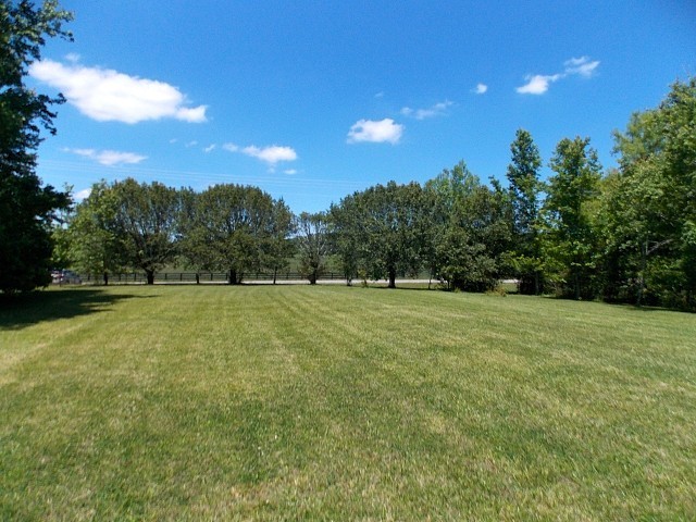12698 Versailles Road Rockvale, TN 37153 - Photo 3 of 30 a view of outdoor space with deck and yard
