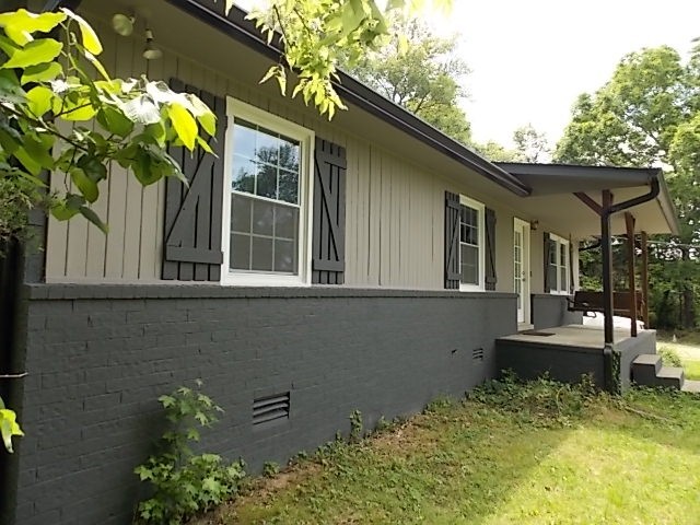 12698 Versailles Road Rockvale, TN 37153 - Photo 7 of 30 a view of a house with a balcony