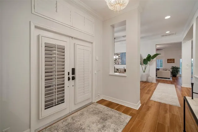 a spacious bathroom with a double vanity sink and a mirror