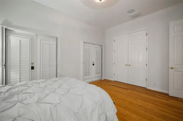 a living room with furniture a fireplace and a potted plant