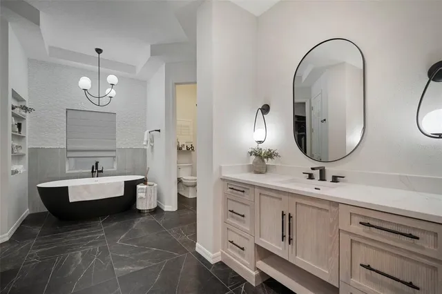 a view of a swimming pool with outdoor seating